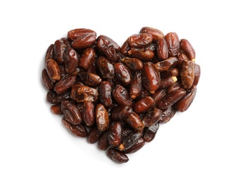 Photo of Heart shaped pile of sweet dried date fruits isolated on white, top view