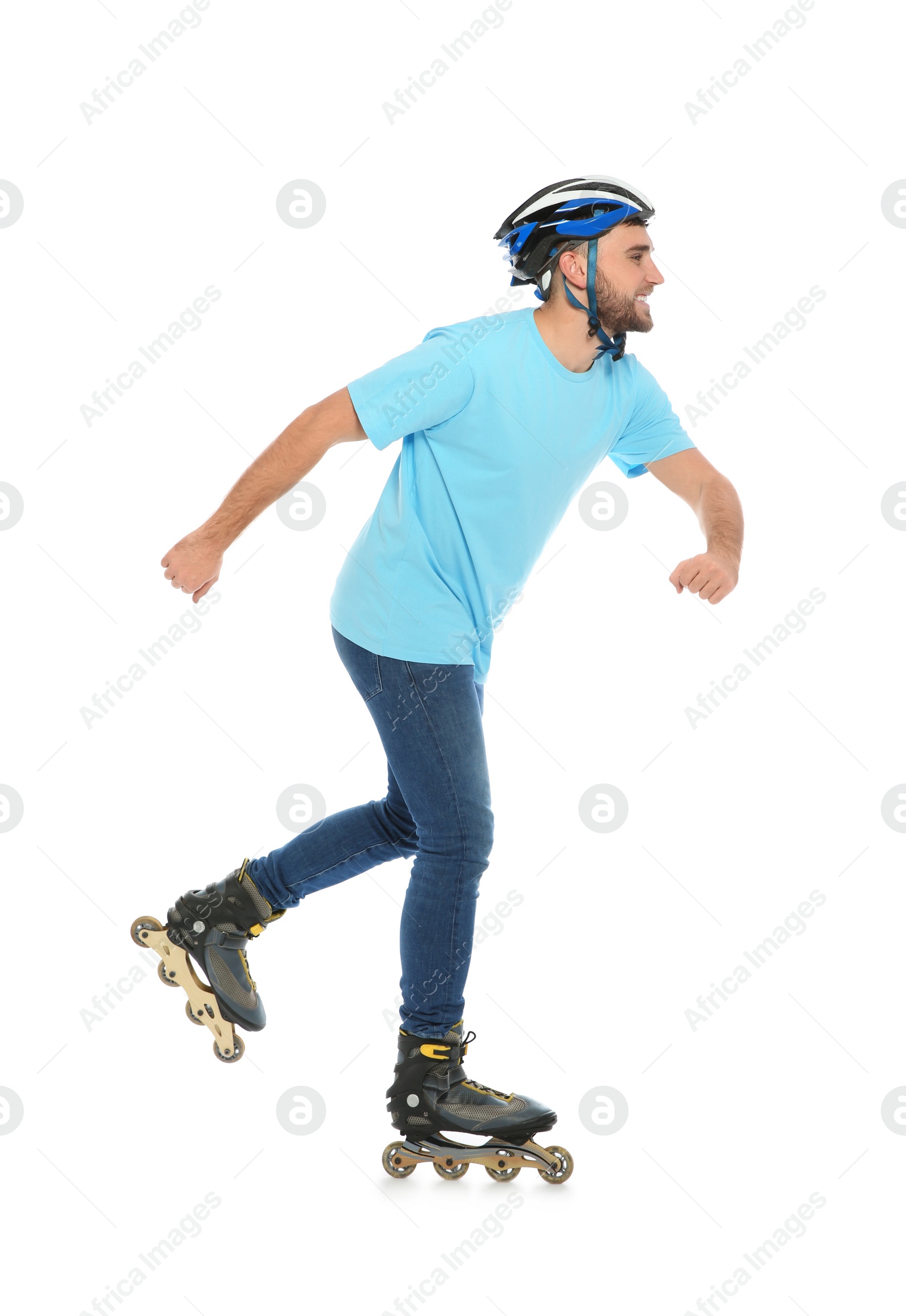 Photo of Young man with inline roller skates on white background