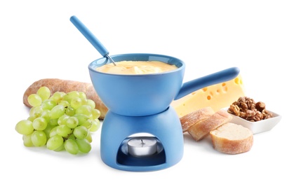 Composition with pot of delicious cheese fondue on white background