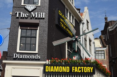 Photo of Amsterdam, Netherlands - June 18, 2022: Exterior of Mill Diamonds jewelry store