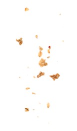 Photo of Pieces of tasty granola isolated on white