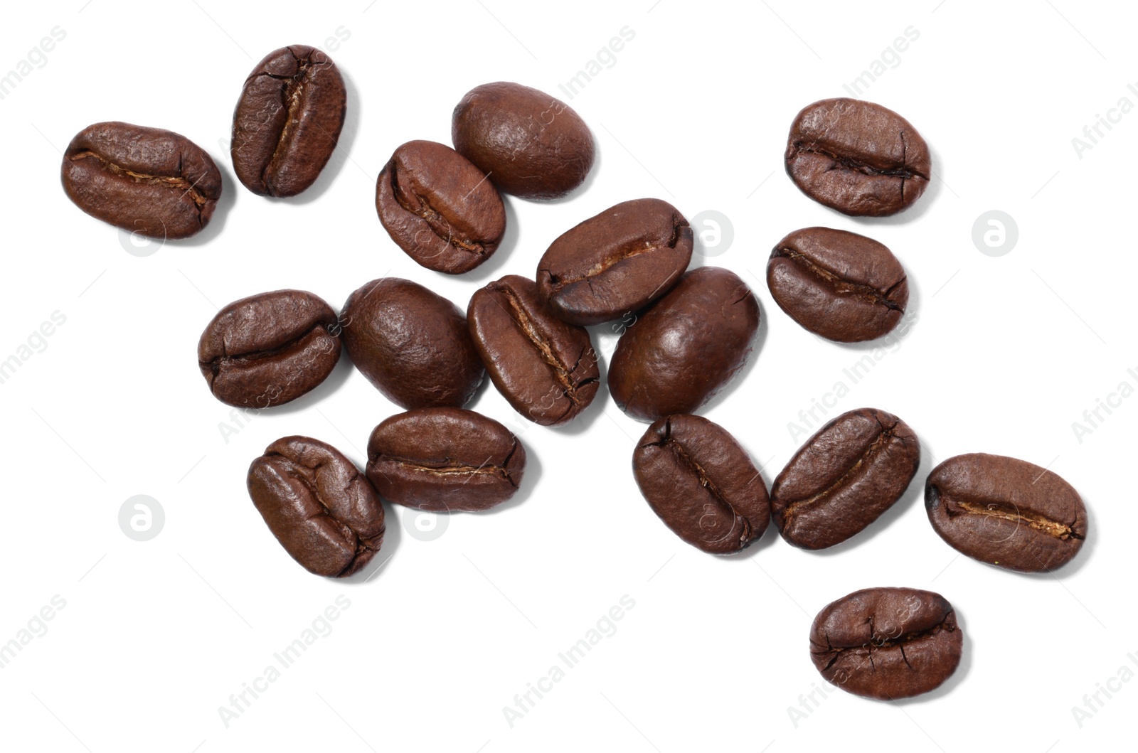 Photo of Many roasted coffee beans isolated on white, top view