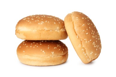 Photo of Three fresh burger buns isolated on white