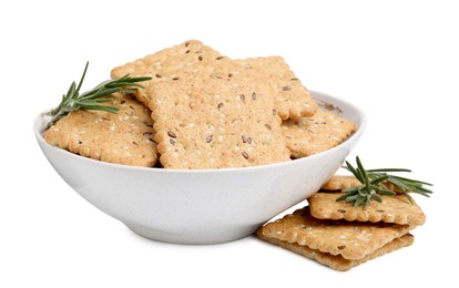 Cereal crackers with flax, sesame seeds and rosemary in bowl isolated on white
