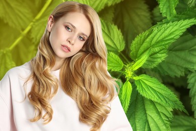 Natural hair care. Beautiful young woman and green stinging nettles