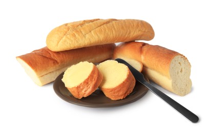 Photo of Cut baguettes with fresh butter on white background