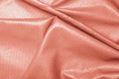 Image of Crumpled rose gold leather as background, closeup