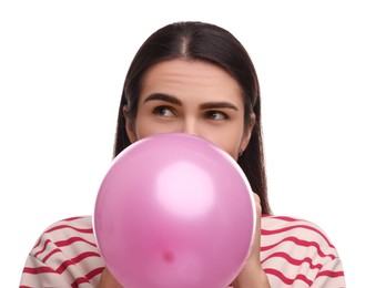 Photo of Woman inflating pink balloon on white background