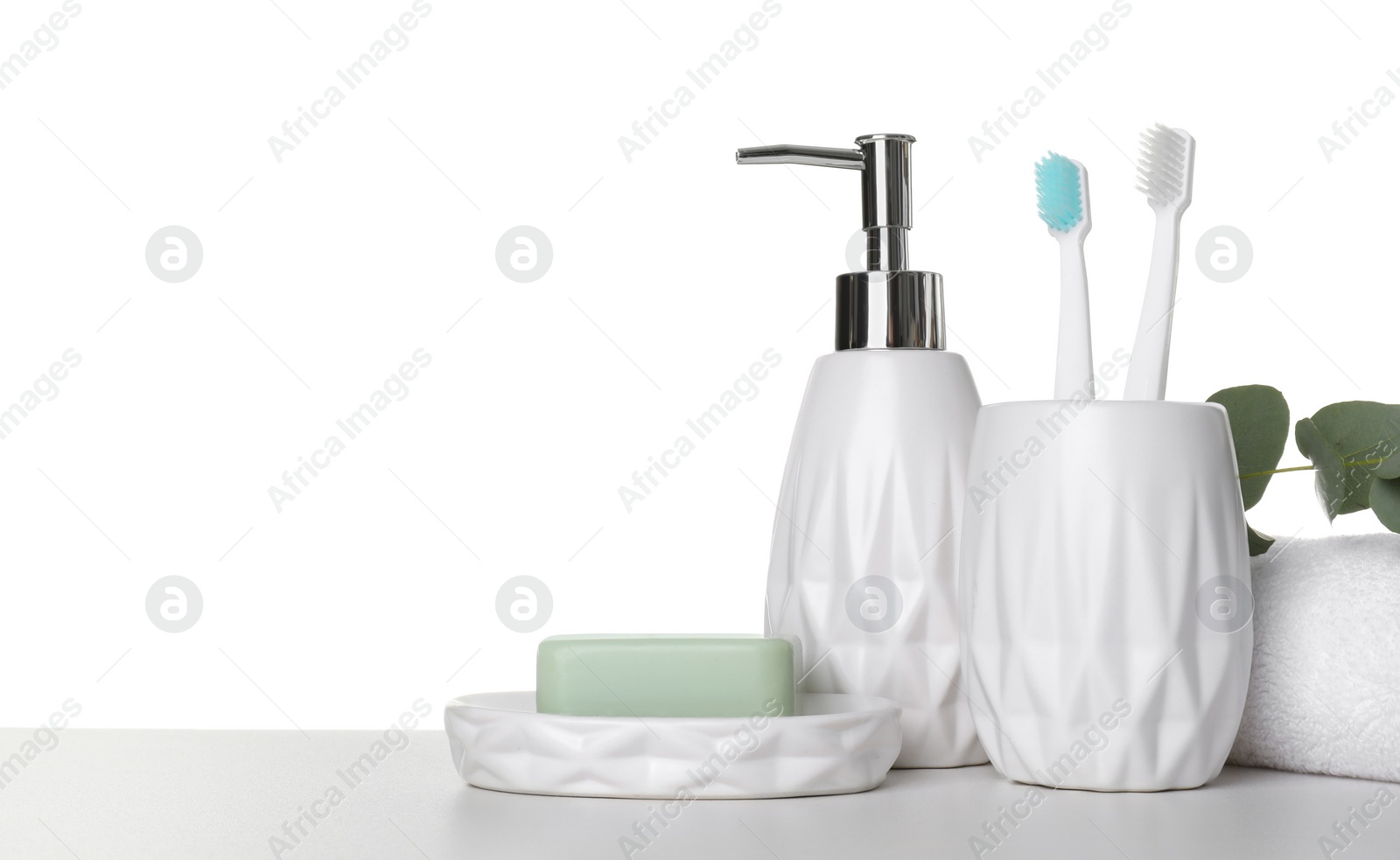 Photo of Bath accessories. Different personal care products on table against white background. Space for text