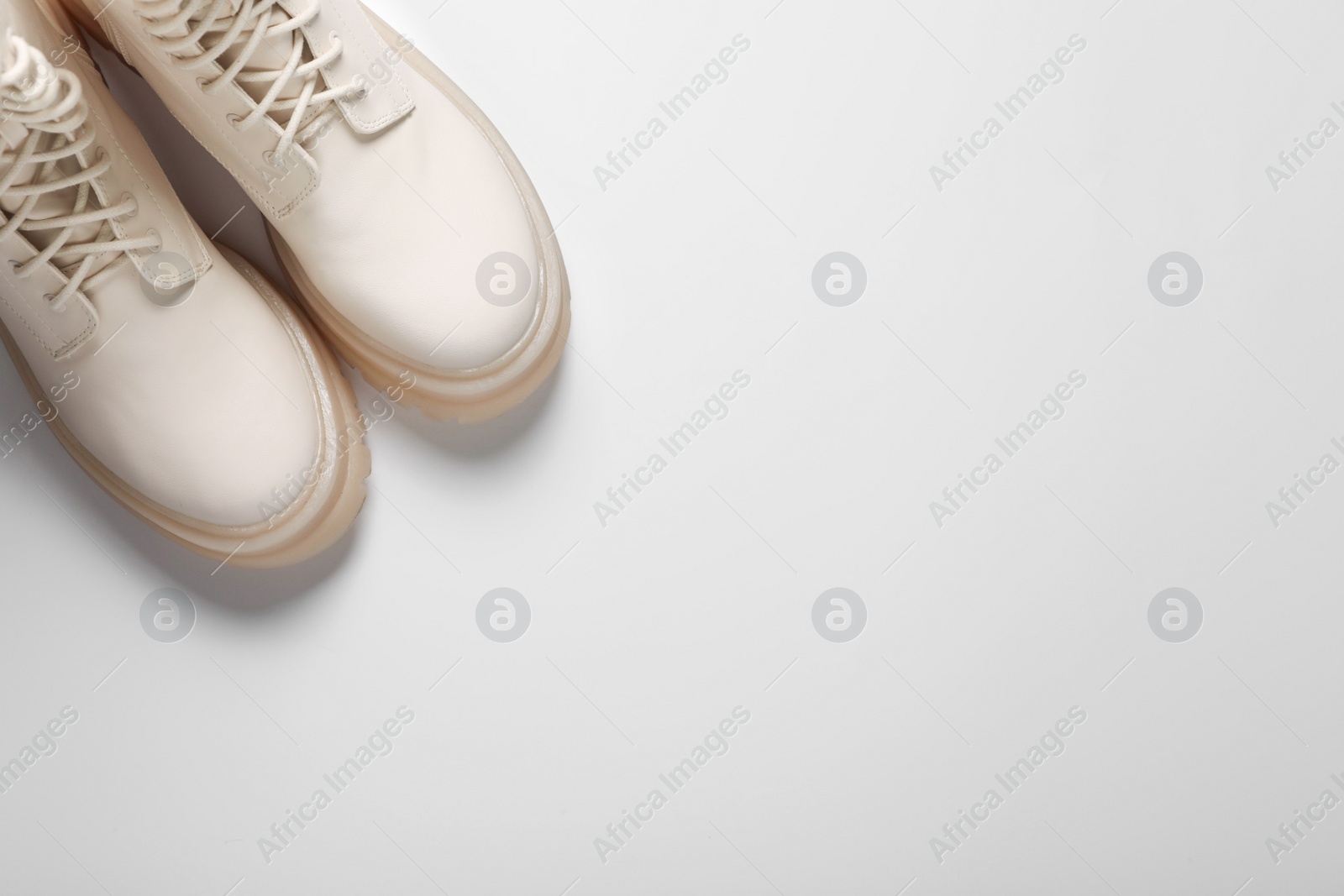 Photo of Pair of stylish leather shoes on white background, flat lay. Space for text