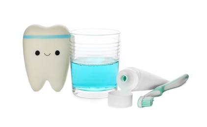 Photo of Mouthwash, toothbrush, paste and holder on white background