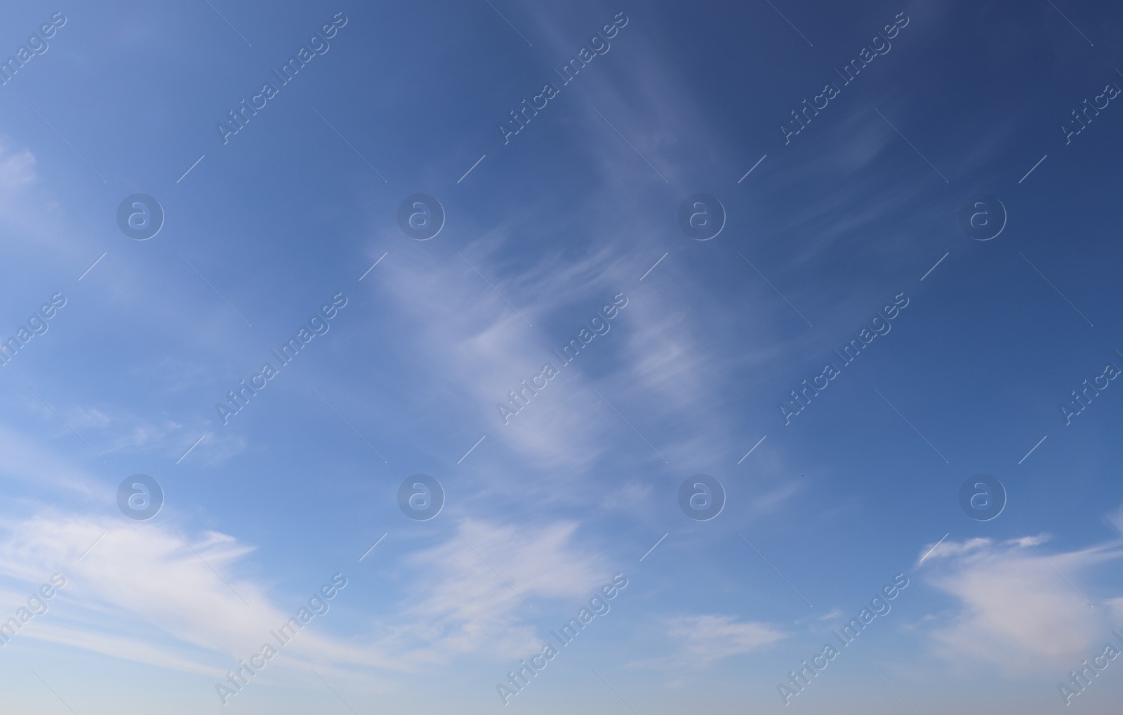 Photo of Beautiful fluffy white clouds in blue sky