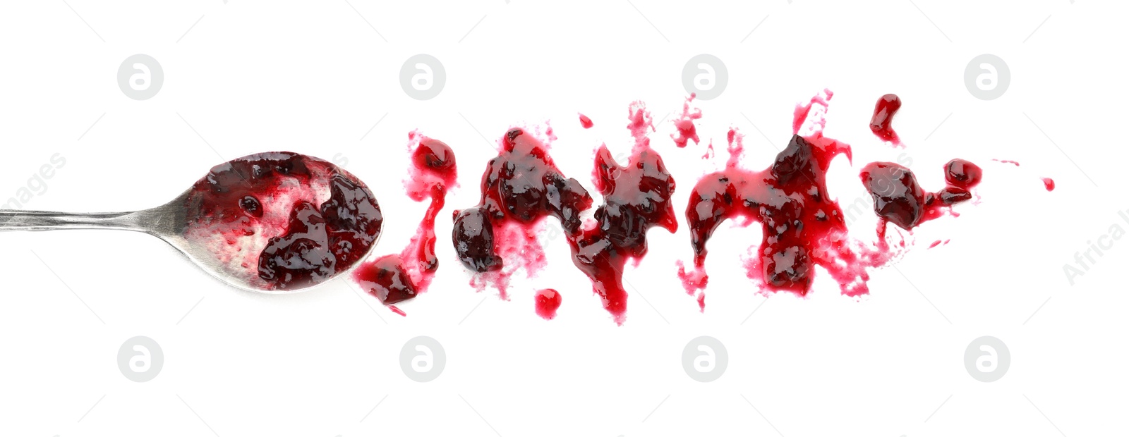 Photo of Spoon and sweet berry jam on white background