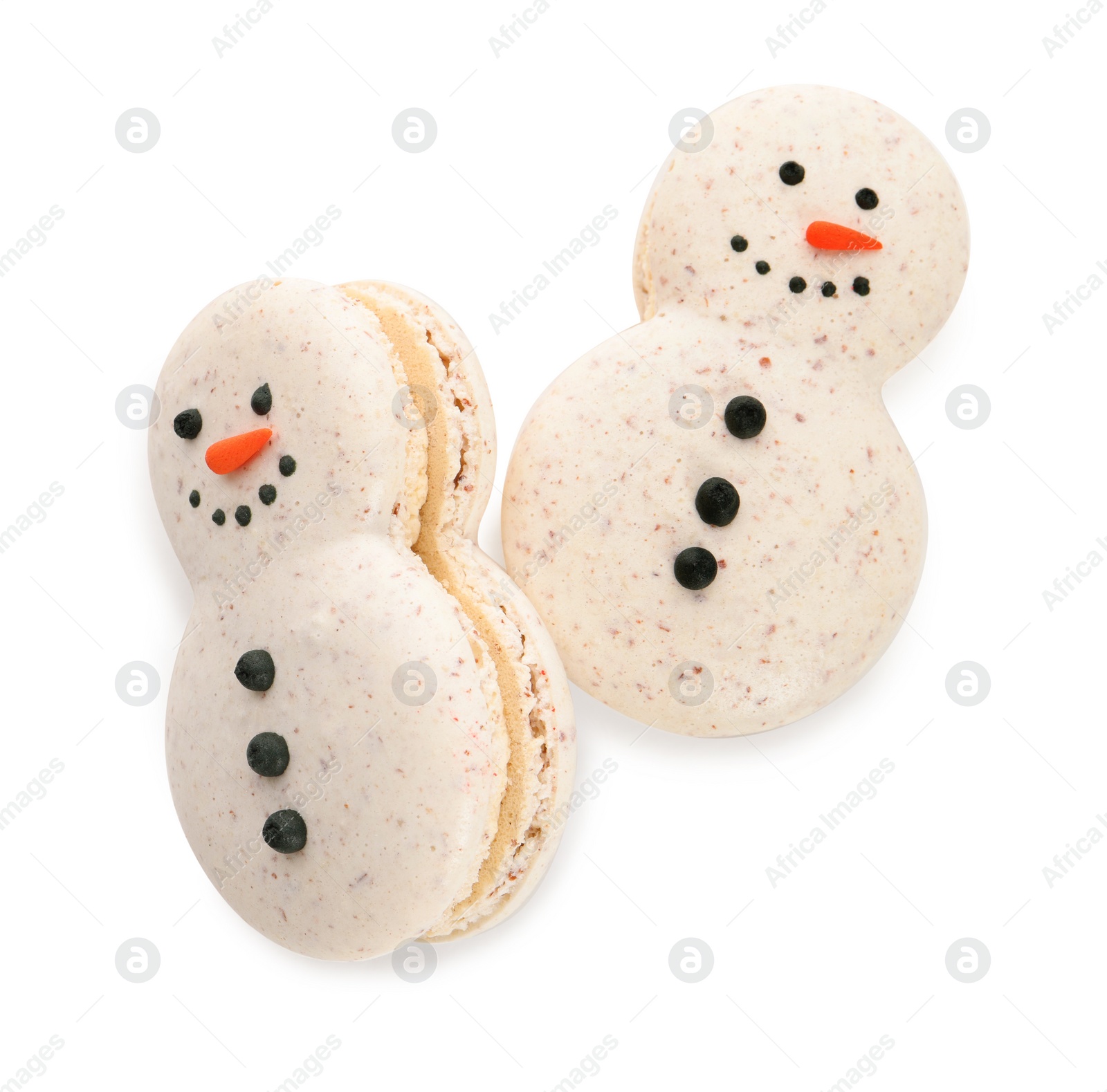 Photo of Beautifully decorated Christmas macarons on white background, top view