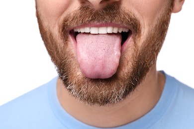 Man showing his tongue on white background, closeup