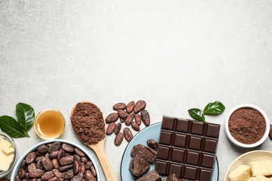 Photo of Flat lay composition with organic cocoa butter on light grey table. Space for text