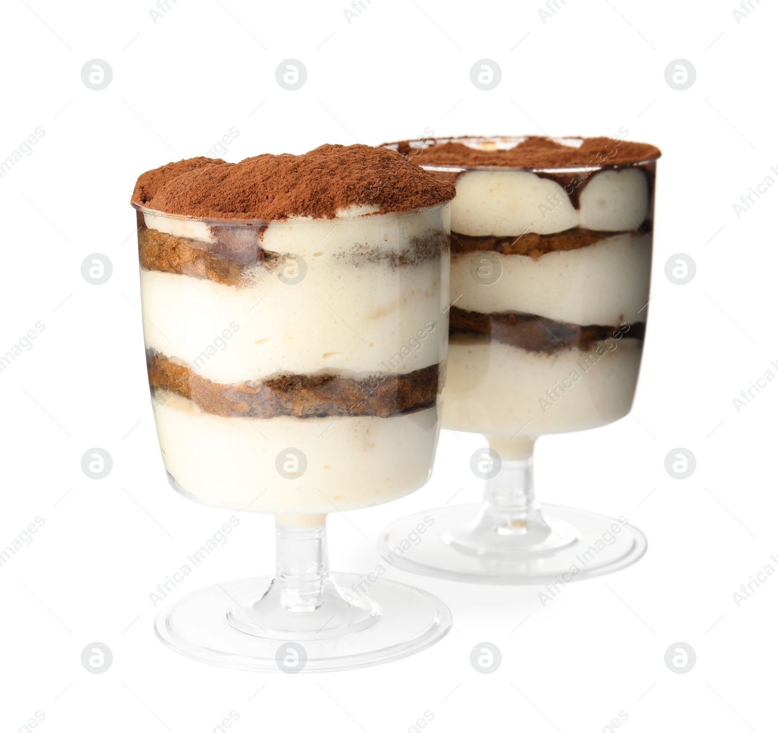 Photo of Two glasses of tiramisu cake isolated on white