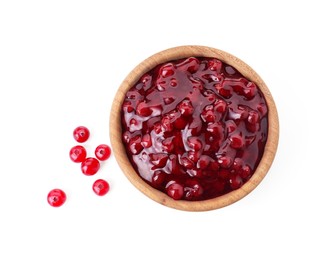 Tasty cranberry sauce in bowl and fresh berries isolated on white, top view