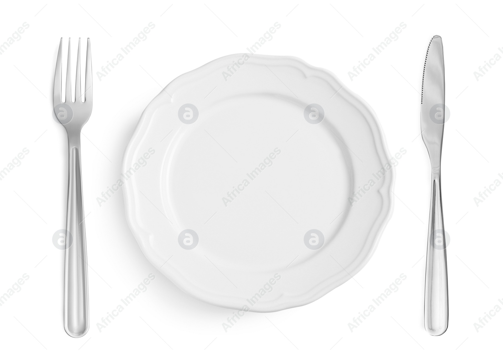 Image of Empty plate with fork and knife on white background, top view