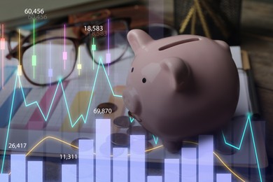 Piggy bank and money on wooden table. Illustration of financial graphs