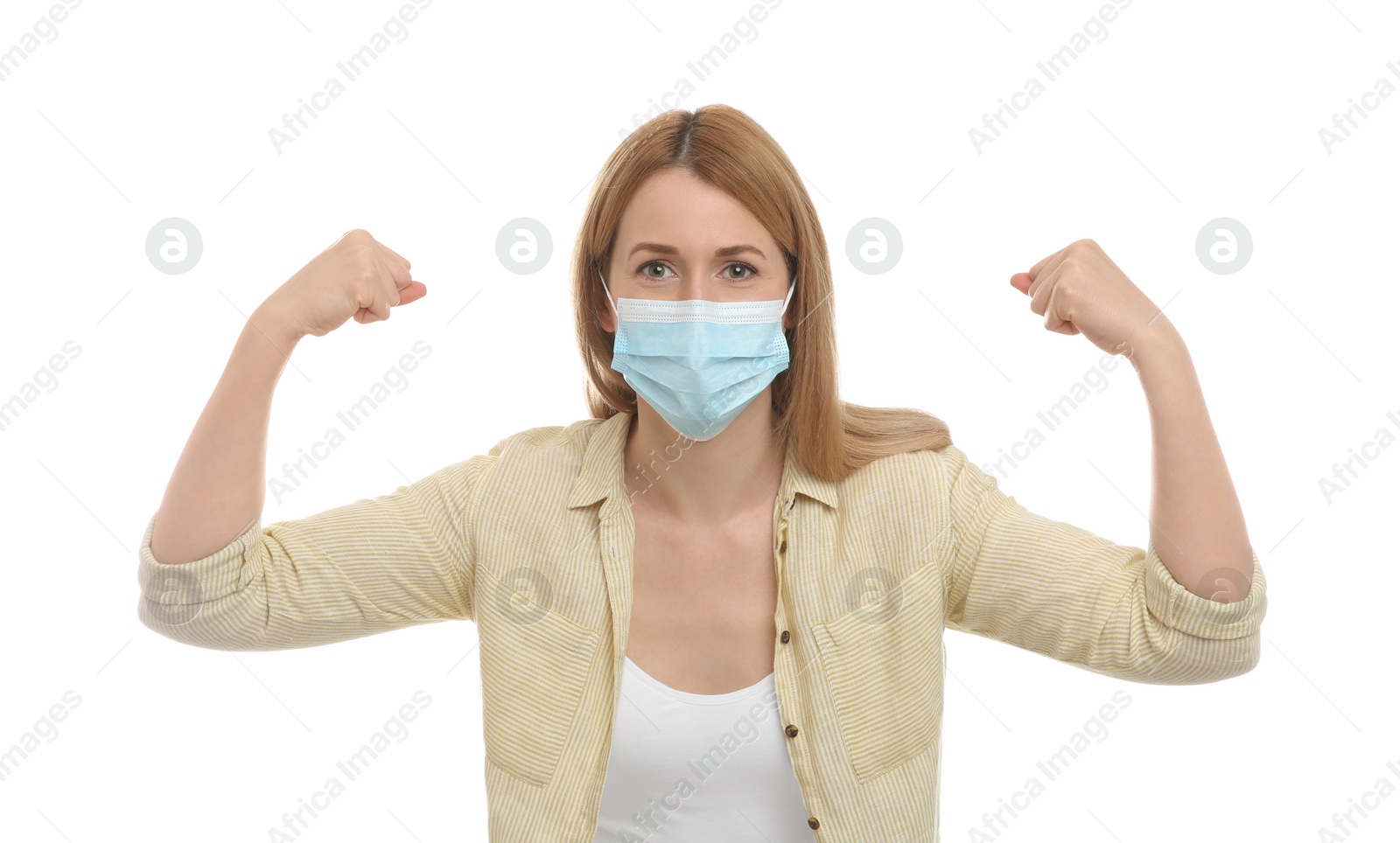 Photo of Woman with protective mask showing muscles on white background. Strong immunity concept