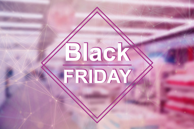 Image of Blurred view of modern shopping mall interior. Black Friday Sale