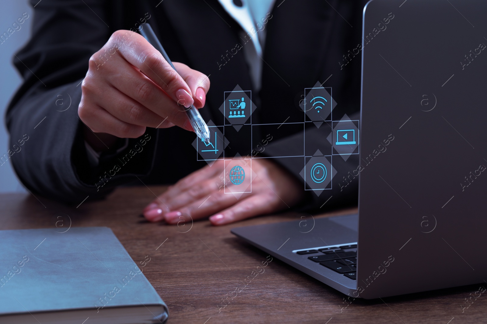 Image of Webinar. Woman using laptop and virtual screen at table, closeup