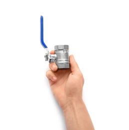 Plumber holding flow control valve on white background, closeup