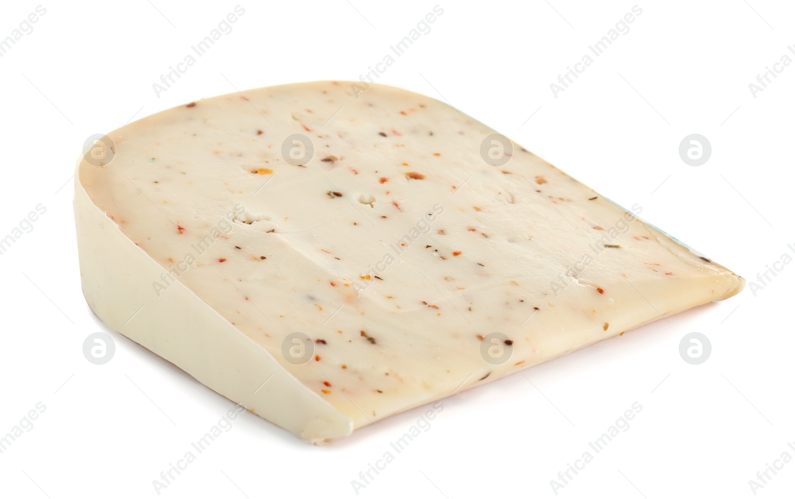 Photo of Piece of tasty cheese with basil and paprika isolated on white