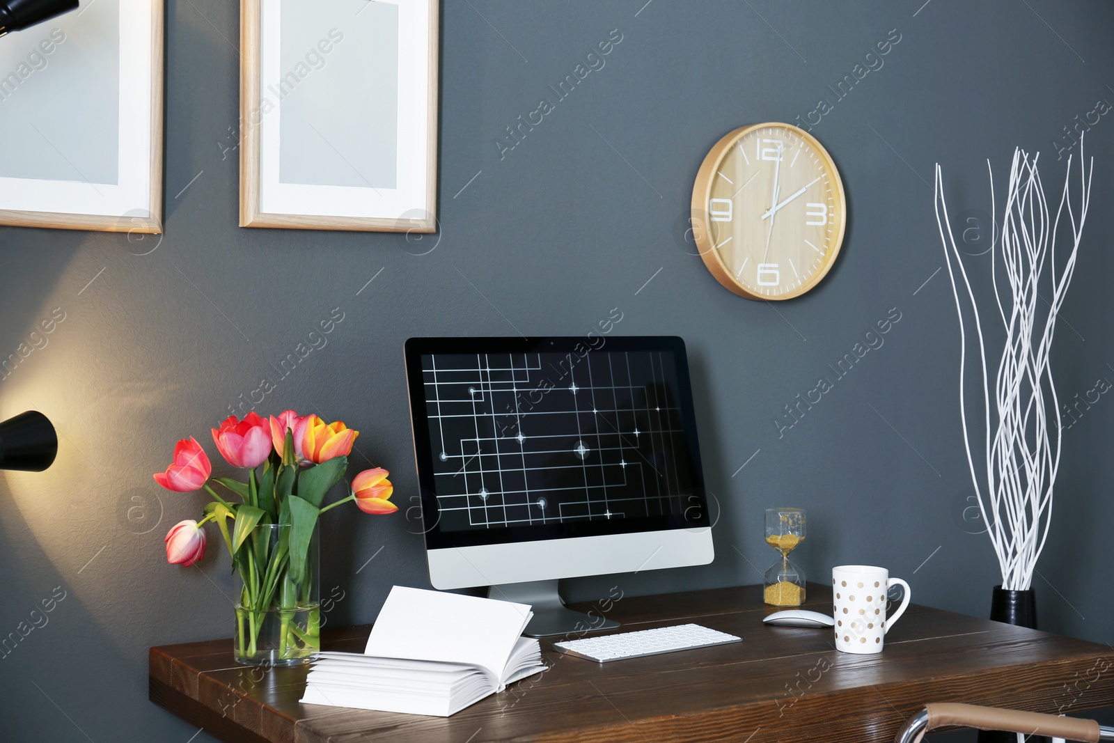 Photo of Stylish modern workplace with computer at home