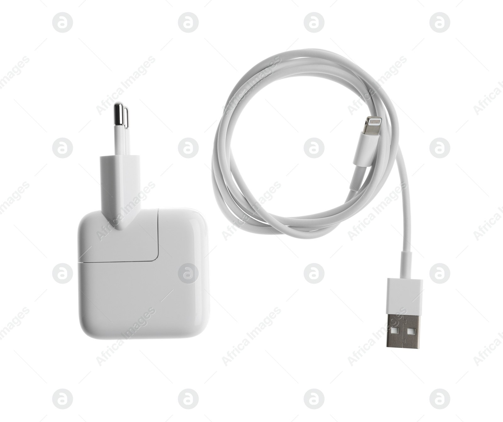 Photo of USB charger isolated on white, top view. Modern technology