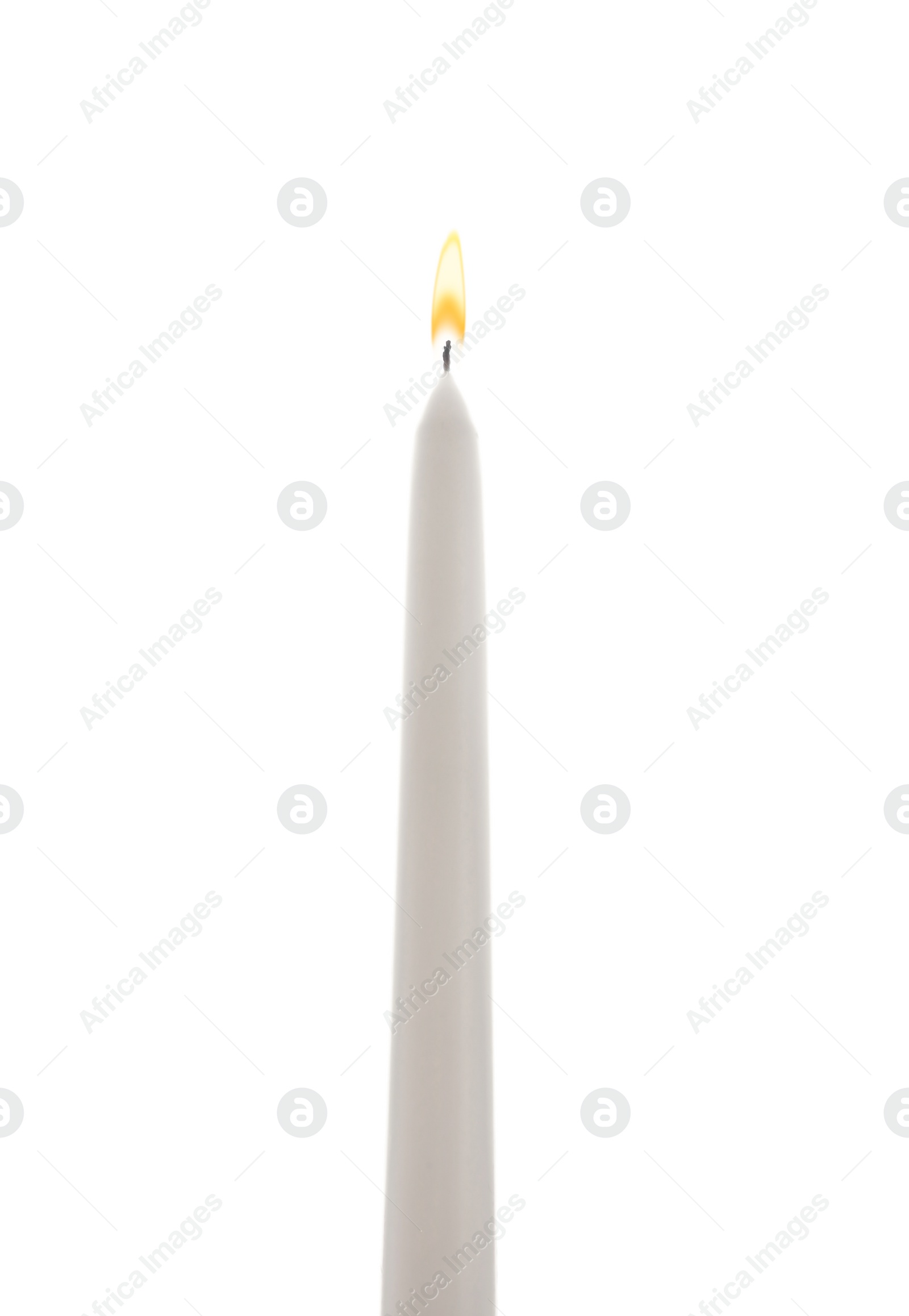 Photo of New wax taper candle isolated on white