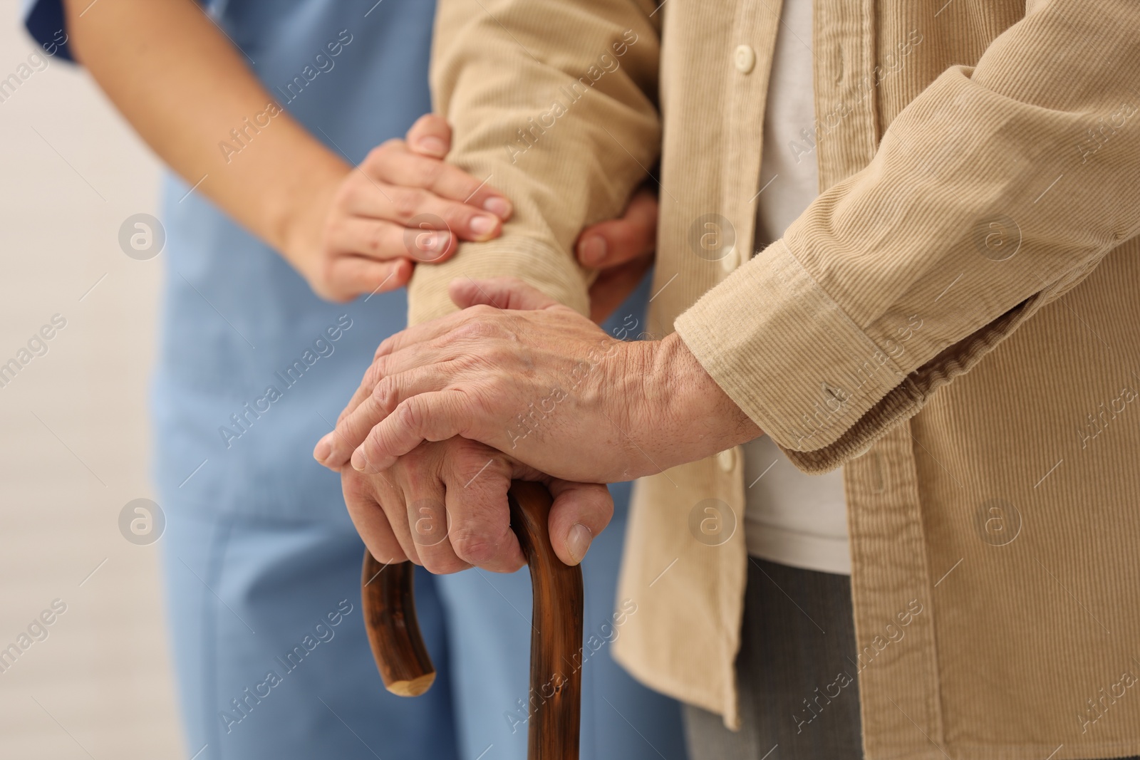 Photo of Health care and support. Nurse with elderly patient, closeup