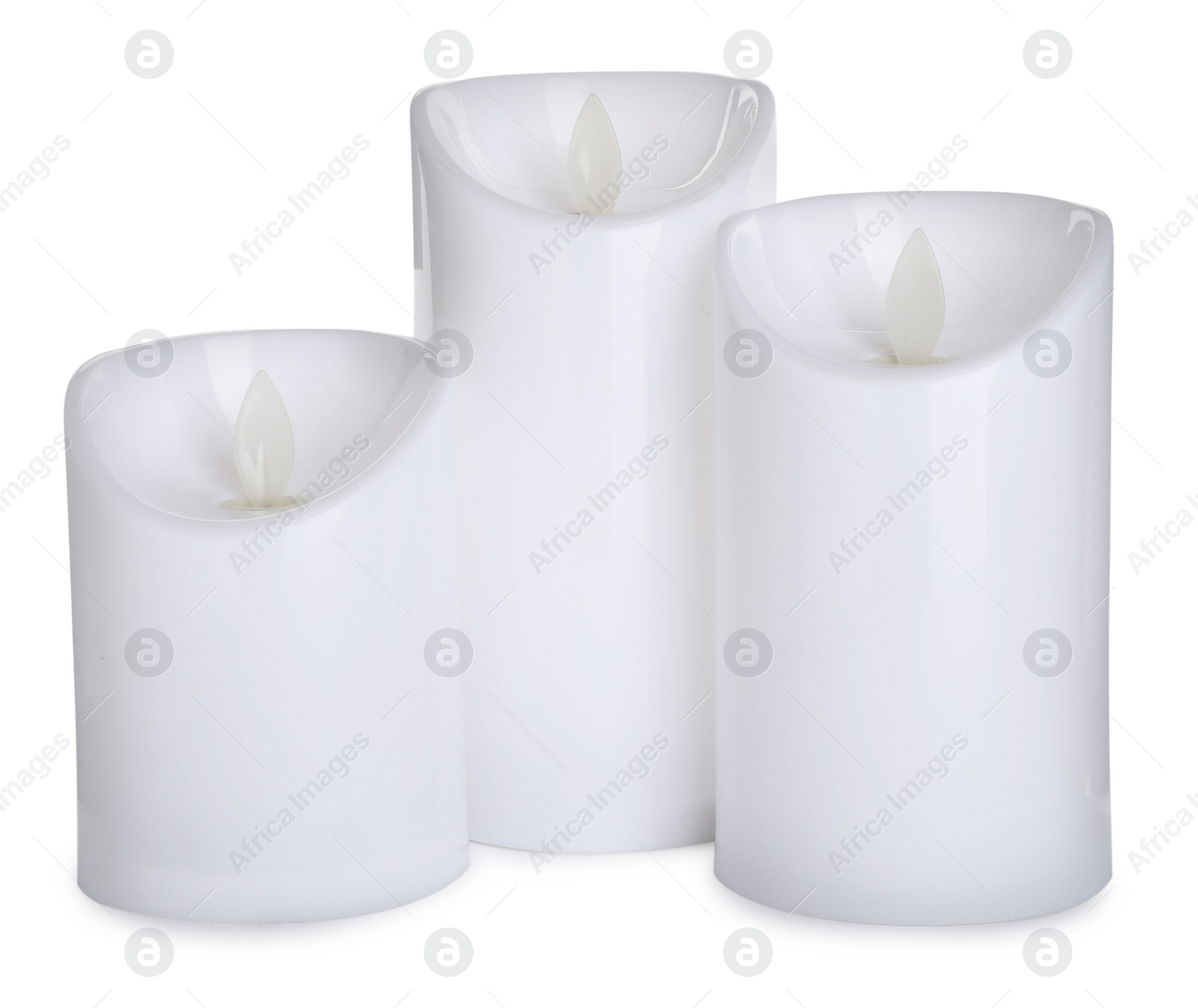 Photo of Decorative flameless LED candles on white background