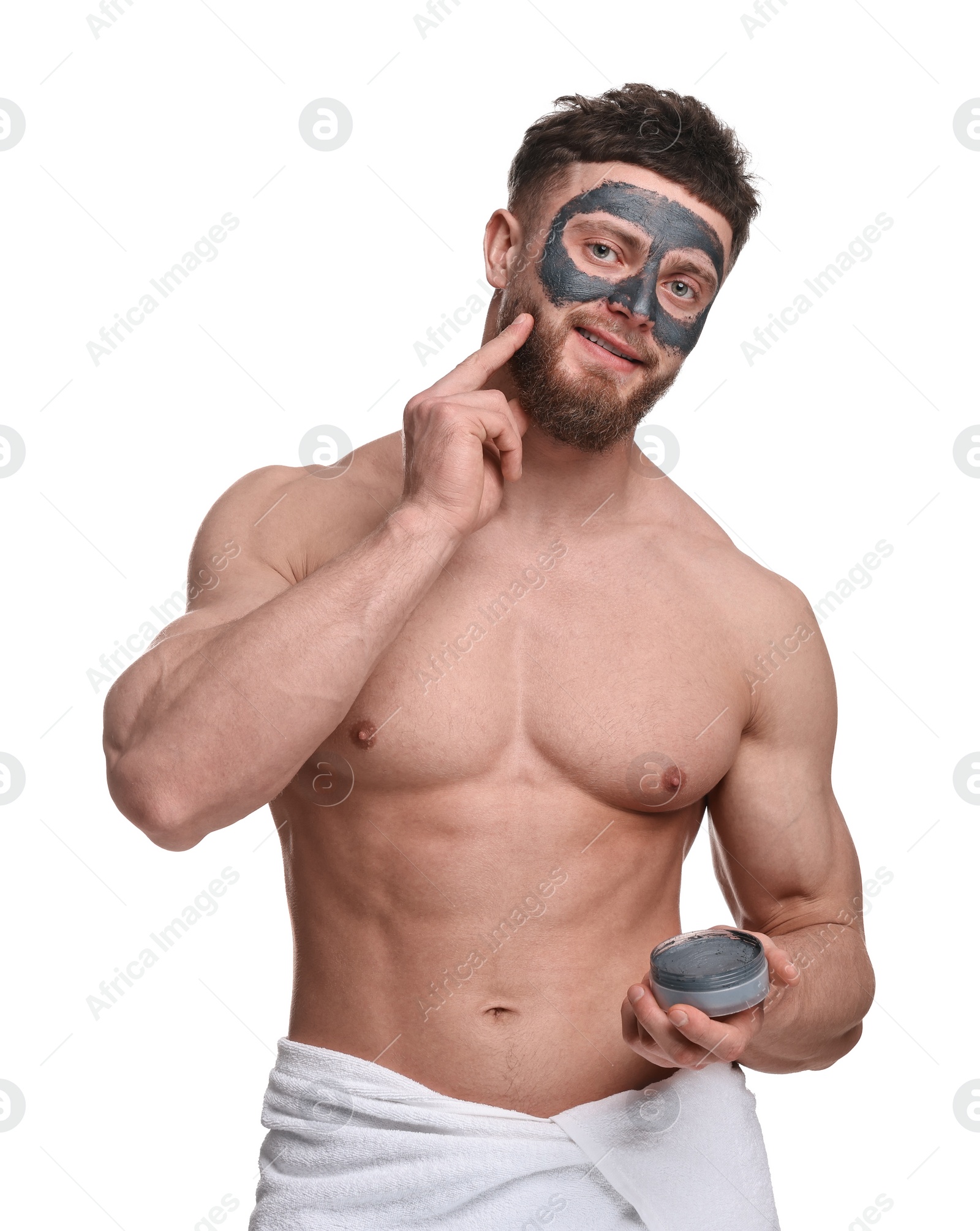 Photo of Handsome man with clay mask on his face against white background