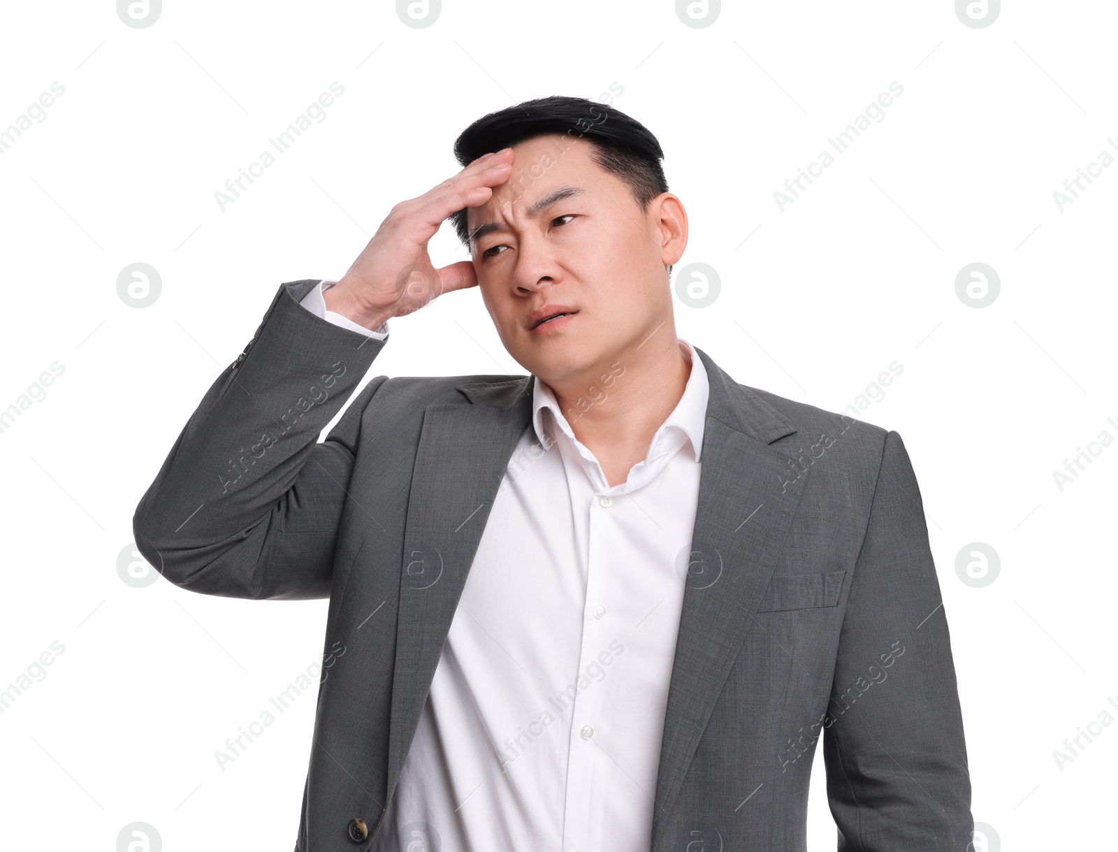 Photo of Tired businessman in suit suffering from headache on white background