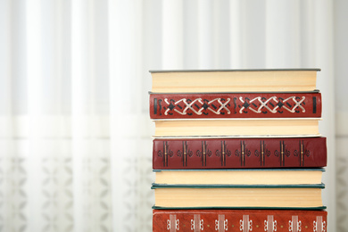 Photo of Collection of different books indoors. Space for text