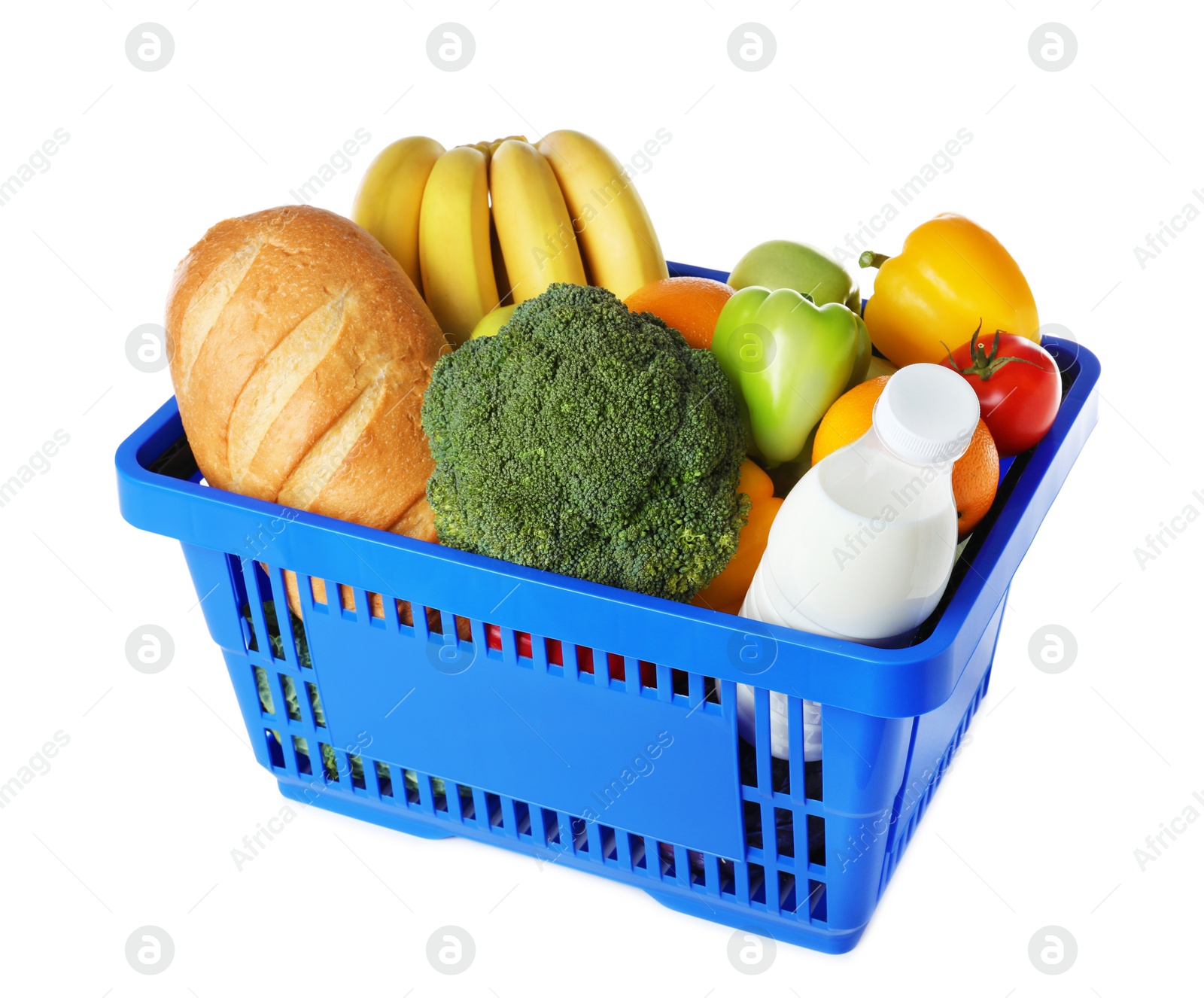 Photo of Shopping basket with grocery products on white background