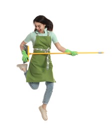 Photo of Beautiful young woman with broom jumping on white background