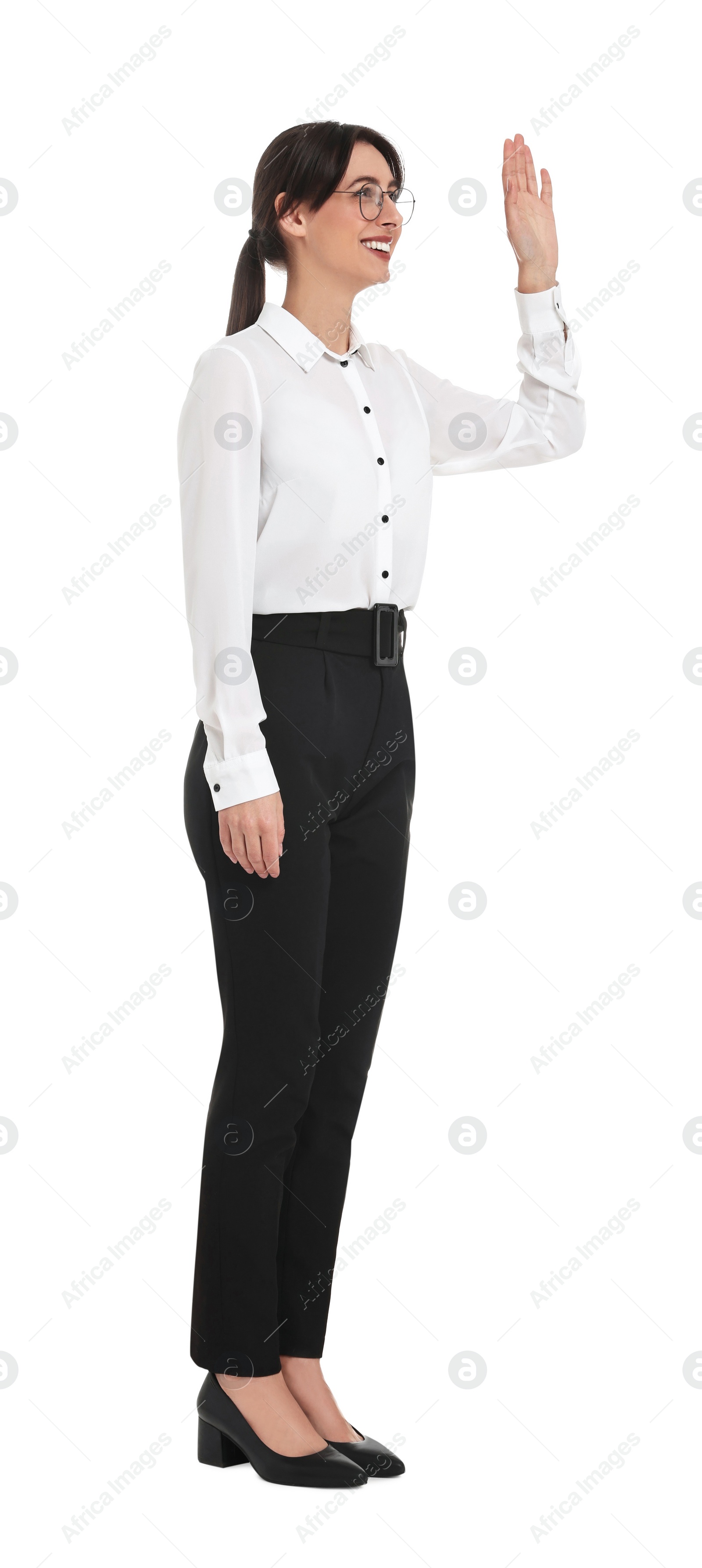 Photo of Happy businesswoman in glasses greeting someone on white background