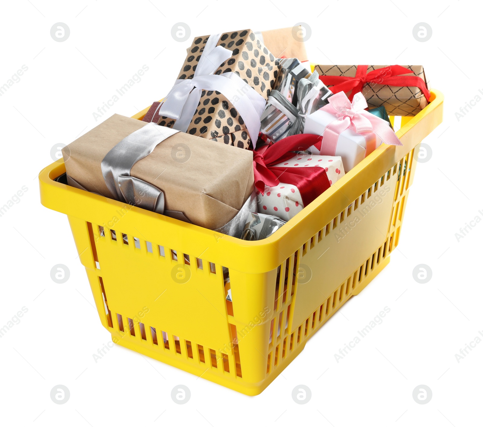 Photo of Shopping basket full of gift boxes on white background