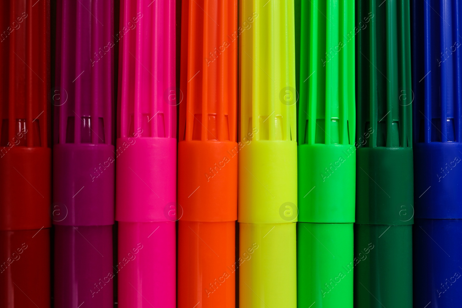 Photo of Set of felt tip pens as background, closeup