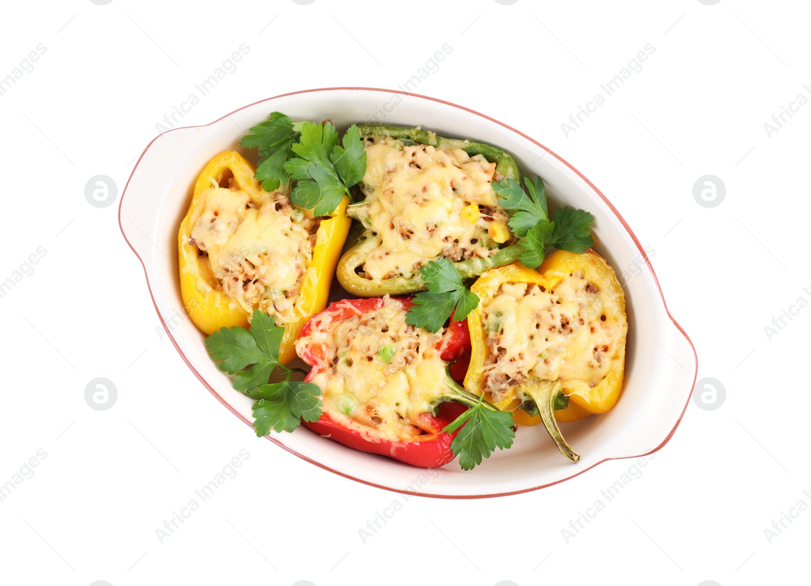 Photo of Tasty stuffed bell peppers in baking dish isolated on white, top view