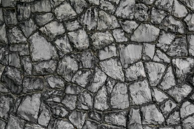 Texture of grey stone wall as background