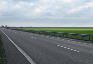 Photo of Beautiful view of asphalt highway without transport