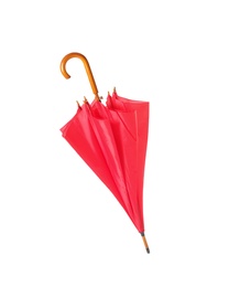 Photo of Modern closed red umbrella isolated on white