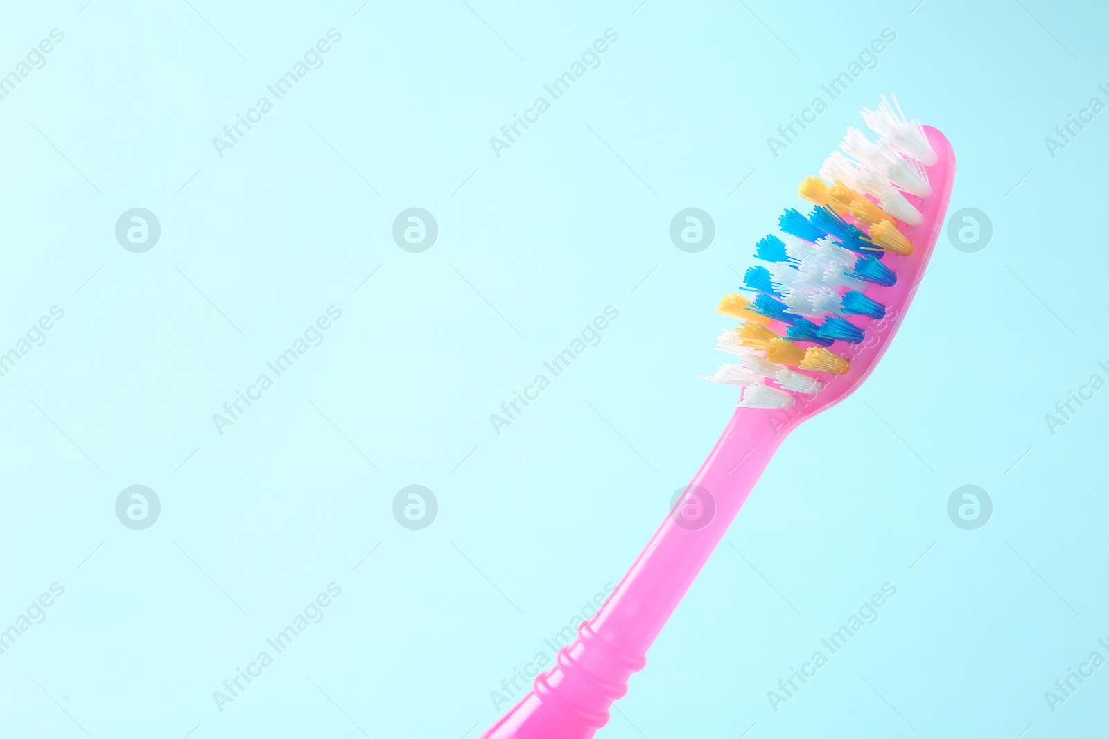 Photo of Manual toothbrush on color background. Dental care