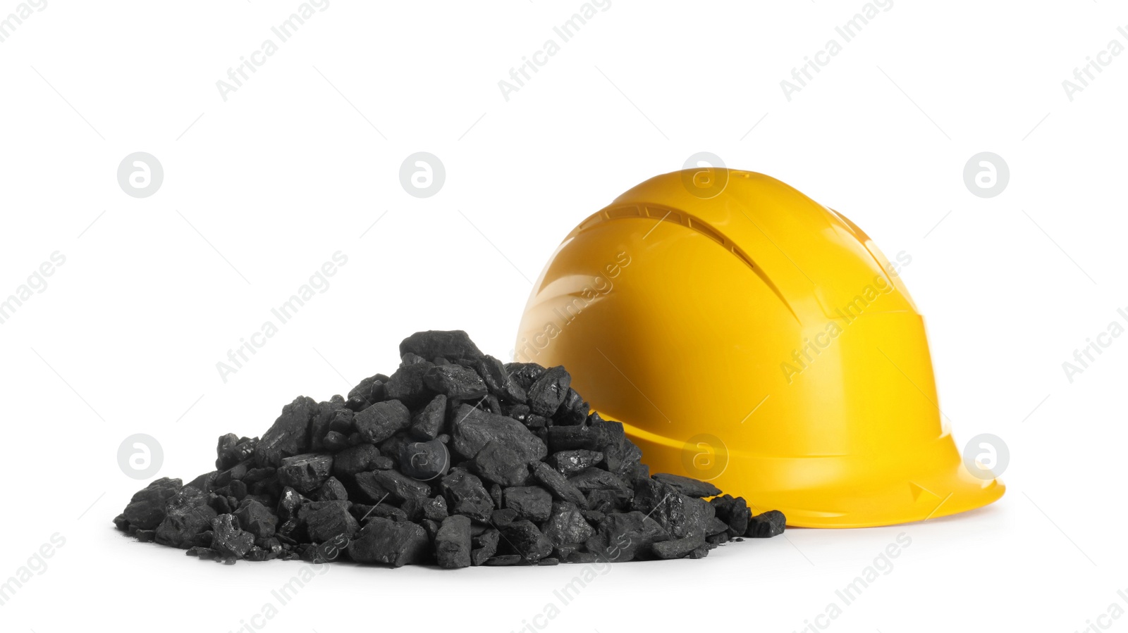 Photo of Heap of coal and hard hat isolated on white