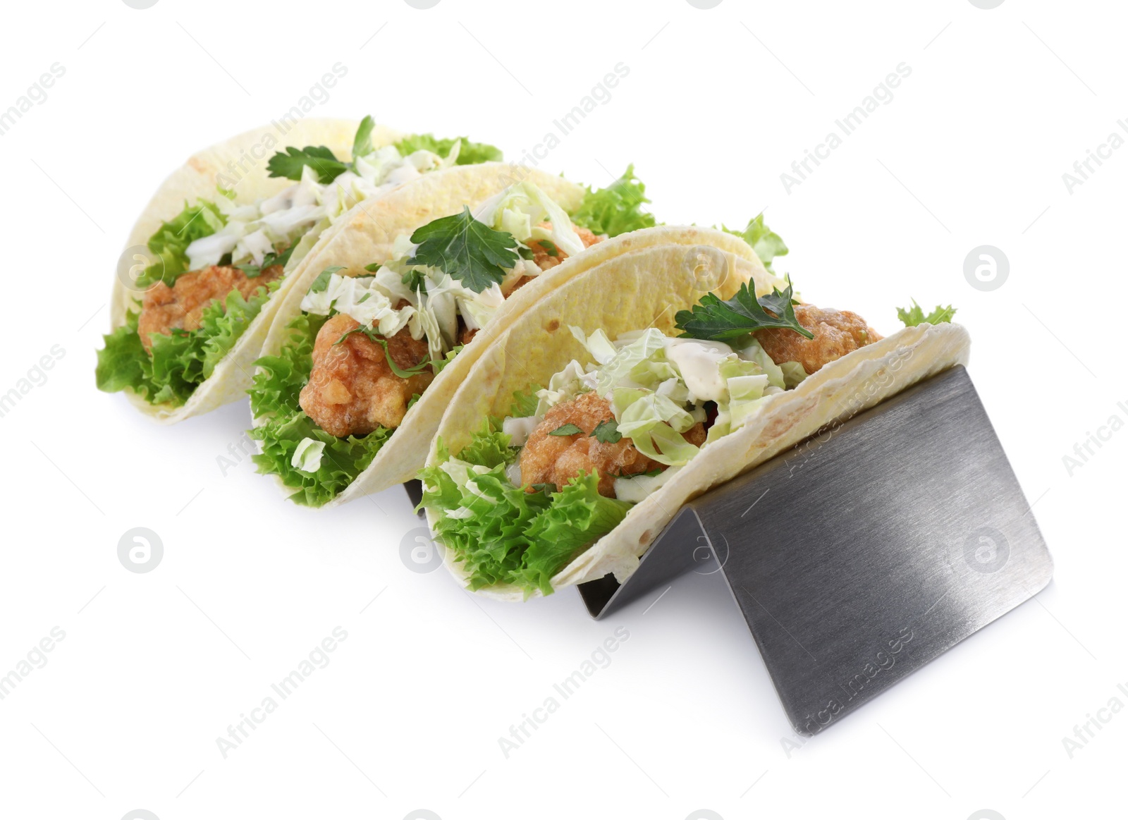 Photo of Yummy fish tacos in holder isolated on white