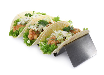 Yummy fish tacos in holder isolated on white